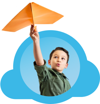 Boy holding a paper airplane