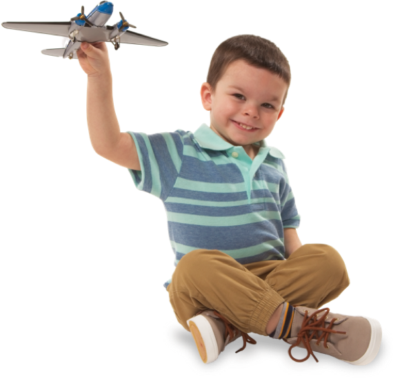 William playing with a model airplane
