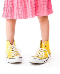 Girl wearing yellow sneakers