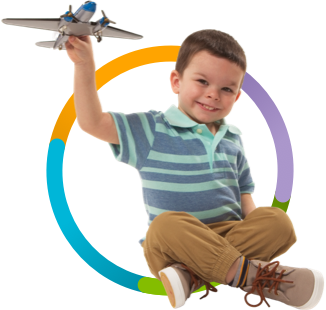 William playing with a model airplane