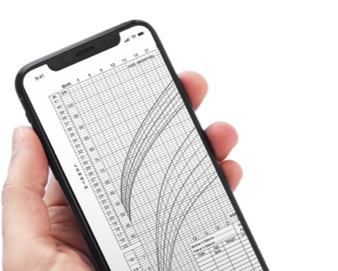 Hand holding a phone showing a growth chart