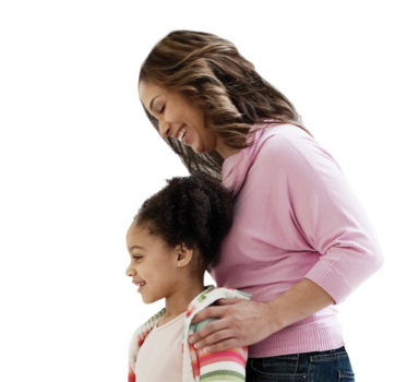 Girl with her mom standing behind her